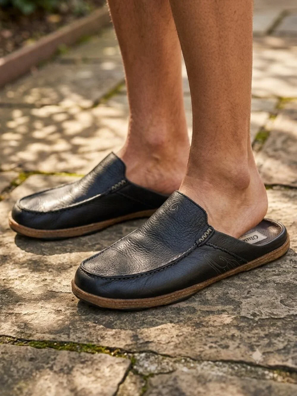 Olukai Kono black leather slip on shoes